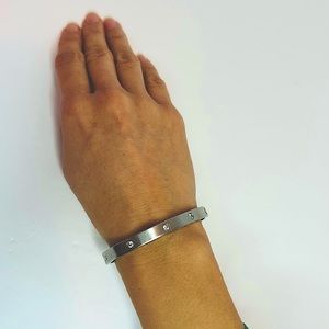 Silver bracelet inlaid with Swarovski crystals